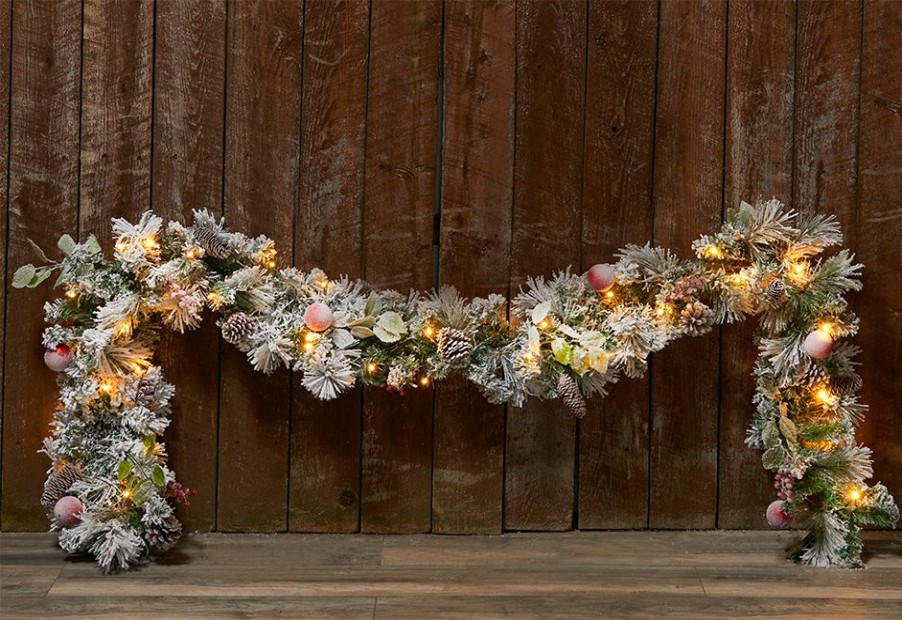 Outdoor Living Camelot SI, LLC | White Flocked 9-Ft. Cordless Pre-Lit Indoor/Outdoor Garland