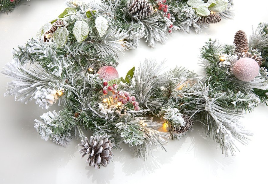 Outdoor Living Camelot SI, LLC | White Flocked 9-Ft. Cordless Pre-Lit Indoor/Outdoor Garland